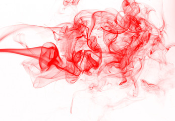 Movement of smoke abstract isolated on white background, red ink water