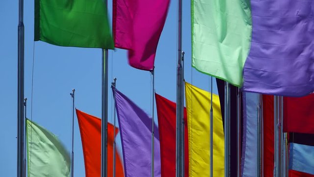 multi colors plain flags on blue sky background