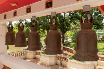 Line of five bells at Buddhist temple
