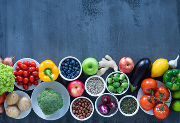 Healthy eating ingredients: fresh vegetables, fruits and superfood. Nutrition, diet, vegan food concept