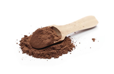 Cocoa powder with wooden spoon isolated on white background