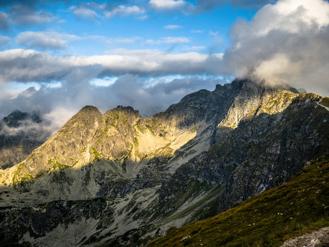 Tatra Mountain part of Carpathian mountain chain in eastern Europe create natural border between Slovakia, Poland. Both protected as national parkland popular destination for winter, summer sports. © Digital Mammoth