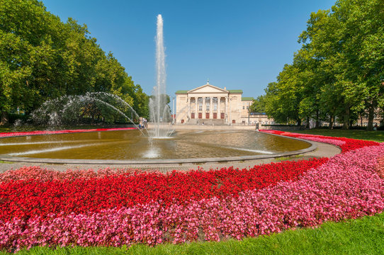 Poznan Stanislaw Moniuszko Great Theatre (Opera) building with fountain and garden, Poland.