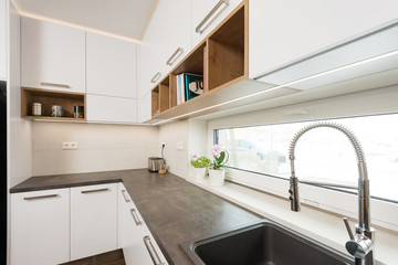 Sink and work top of modern kitchen