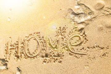 Beautiful drawing on the sand of the sea background