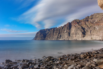 Los guios stone beach looking to Los Gigantes cliffs in Tenerife