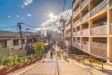 The famous Yuyakedandan stairs which means Dusk Steps at Nishi-Nippori in Tokyo. The landscape overlooking Yanaka Ginza from the top of the stairs is famous as a spectacular spot for sunset.