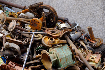 pile of old cars abandoned on a rubbish heap