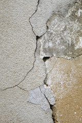 Grunge concrete cement wall with crack in industrial building, great for your design and texture background