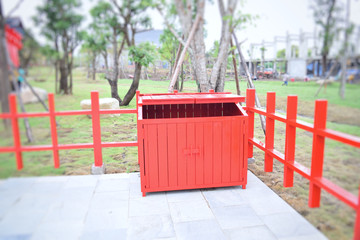 wood trash bin in park