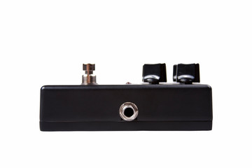 Black guitar effect pedal input - side input view, isolated on white background