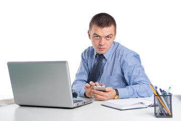 Businessman with phone at workplace isolated on white background