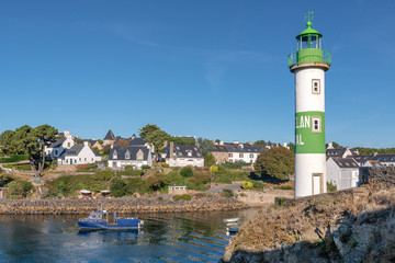 Fototapeta na wymiar French landscape - Bretagne. Lighthouse in a small fishing village.
