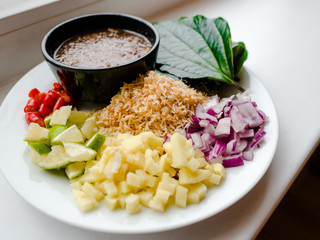 Close up, Close-up Thai-Style Savory Leaf Wraps (Miang Kham) a traditional snack from Thailand and Laos, introduced to Siamese court, Name Miang Kham