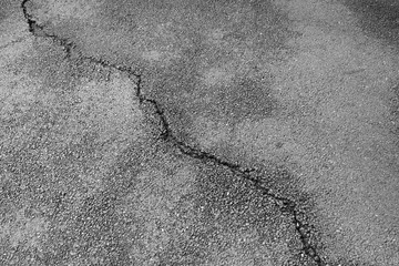 Obraz premium crack asphalt road texture