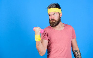 Athlete on way to stronger body. Healthy habits. Sportsman retro outfit training blue background....