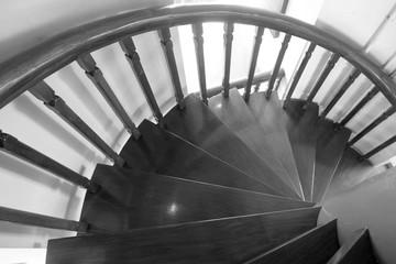 black and white high angle shot of wood stairway