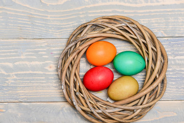 Healthy and happy holiday. painted eggs in nest. Happy easter. Egg hunt. Spring holiday. Holiday celebration, preparation. copy space. Pleasant spring day