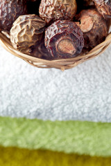Soap nuts (soapberries). Chemical and toxin free laundry, organic detergent. Copy space