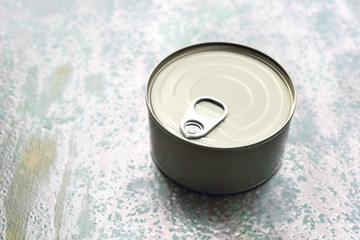 Canned. Can with food.