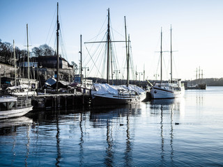 Fototapeta na wymiar Scene view of the ships and boats in Oslo port, Norway