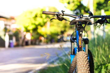 Ride the bike in the village.