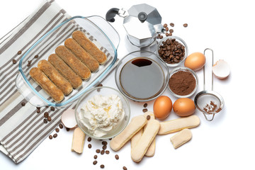 Ingredients for making traditional italian cake tiramisu on white background