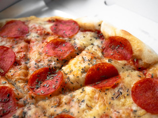 Close Up Italian Recipe Hot Homemade Pepperoni Pizza Ready to Eat, Delivery served in a box, Close Up. 