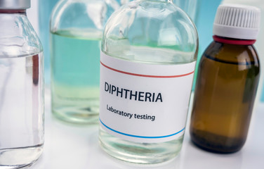 Test diphtheria in laboratory, conceptual image, composition horizontal