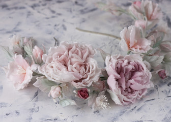 Pink silk flower wedding wreath on white background