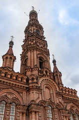 Fototapeta na wymiar Epiphany bell tower of the orthidoxal Church on Bauman street in Kazan city. This is one of the highest Orthodox bell towers. Tatarstan republic, Russia