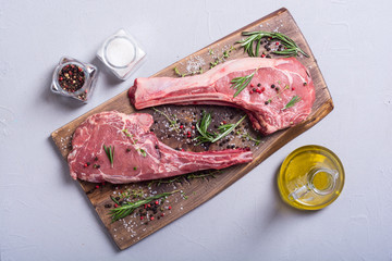 Raw beef tomahawk steak