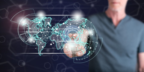 Man touching a global network technology concept