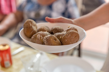Plate of grilled potatoes with salt