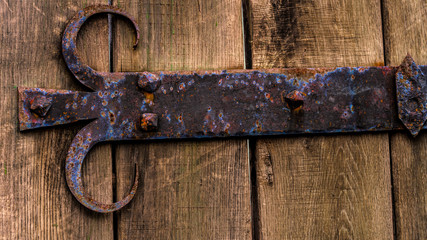wooden gate with wrought iron elements, wood texture