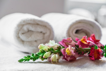 Fototapeta na wymiar Textile towels with flower isolated on white