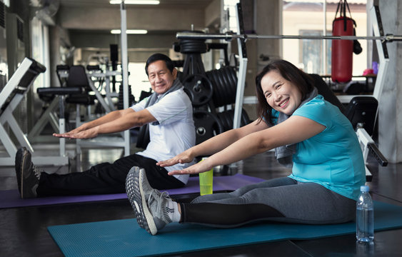 Group Friend Of Senior Stretching Exercise At Yoga Gym. Smiling And Happy.  Elderly Healthy Lifestyle.