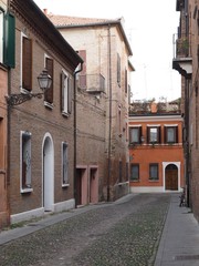 Ferrara, Italy. Historic centre, ancient street.