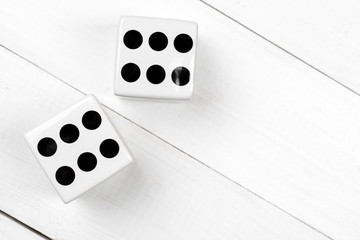 Dice against wooden background