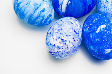 blue Easter eggs isolated on white.