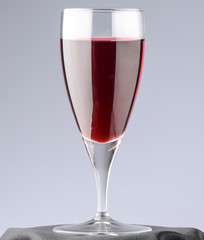 closeup of a glass of red wine