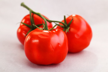 three red tomatoes