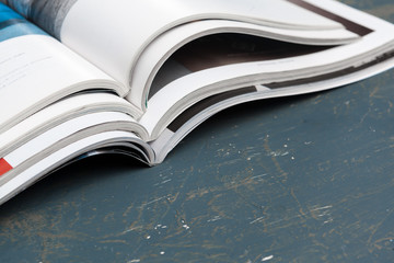 Close up stacking magazine place on table background