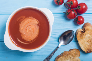 Fresh tomato cream soup in bowl