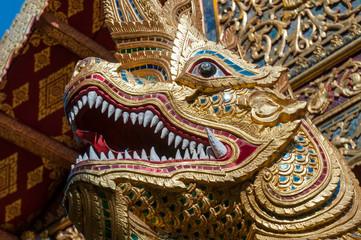 Fototapeta na wymiar Naga decoration on baluster, Wat Phra Singh, Chiang Mai, Thailand.