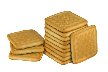 square biscuit isolate on a white background. Stack of tasty biscuits isolated on white background.  square shaped cookies on a white background.. Crackers isolated on a white background 