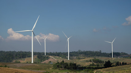 wind mill farm with blue sky background