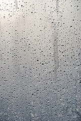 raindrops on glass in sunny weather