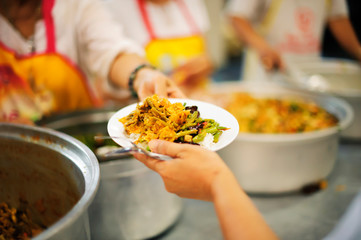 The concept of society in sharing each other, donating to the poor