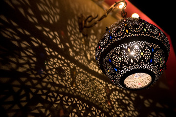 Lamp and the light pattern on the wall